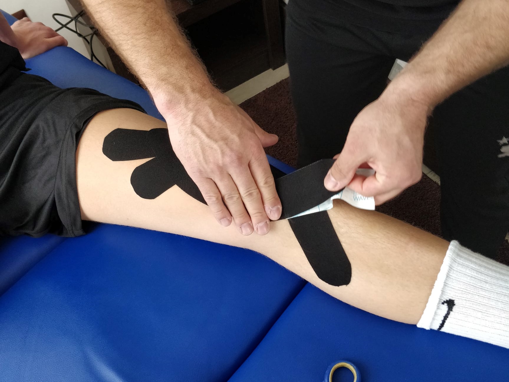 Ofte kan aflastning med tape reducerer generne fra Osgood-Schlatter